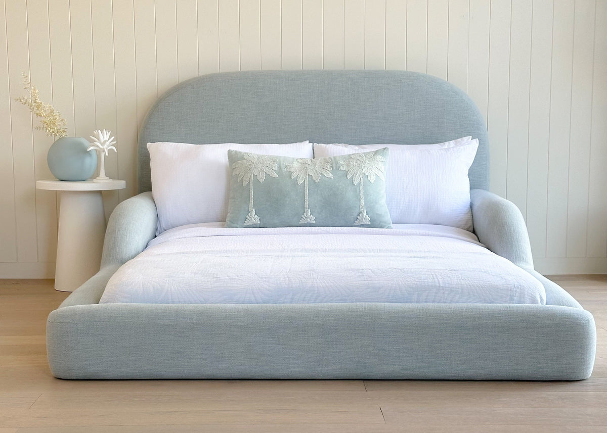 Blue kids bed with guards rails