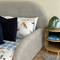 Close view of kids bed guard rail in grey boucle