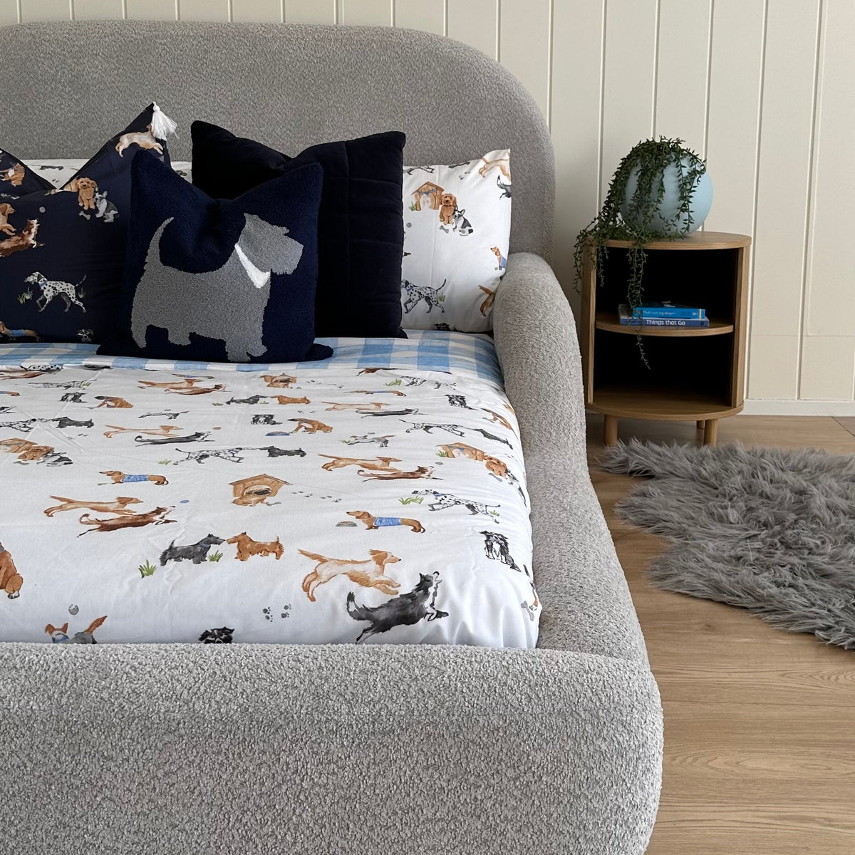 Grey boucle kids bed with guard rails