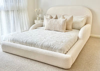 Tulum Kids Bed in white upholstery with rounded, cushioned frame by Kamari Furniture