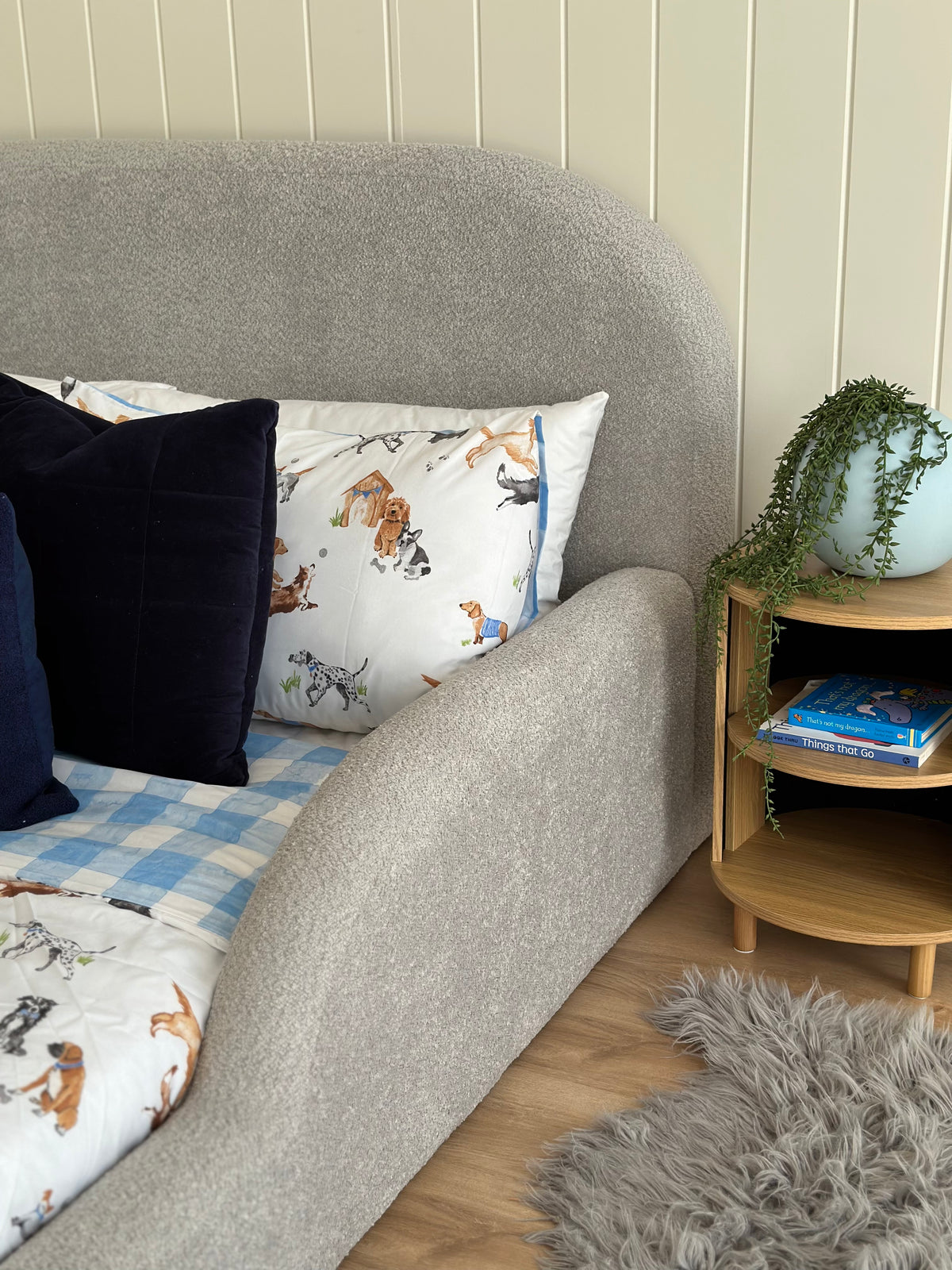 Close view of kids bed guard rail in grey boucle