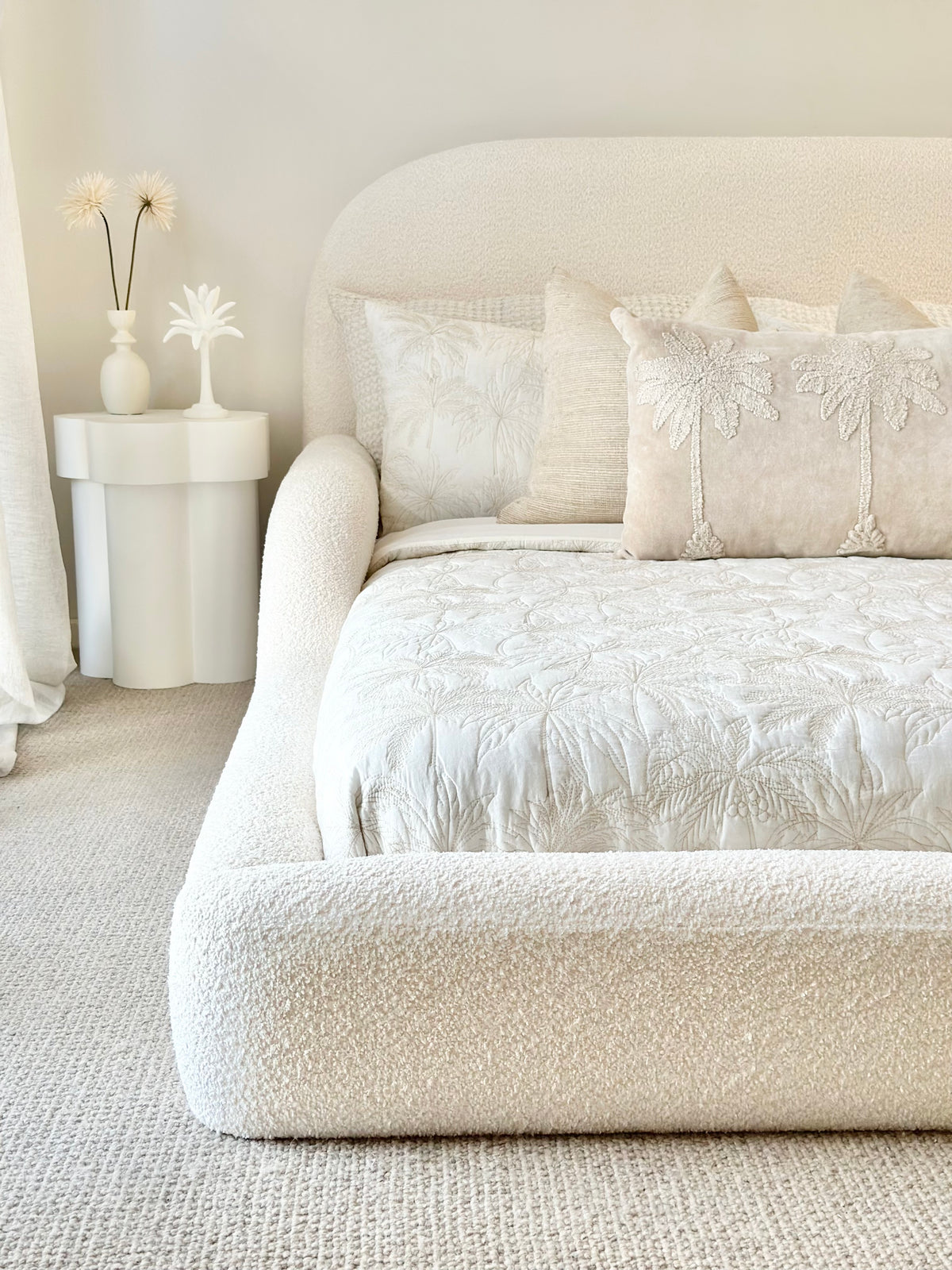 Close up of kids bed in white boucle fabric