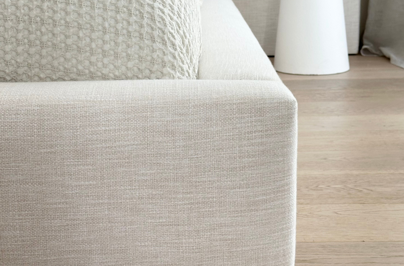 Close up of fabric texture and corner detailing on the Elouda Bed Frame 
